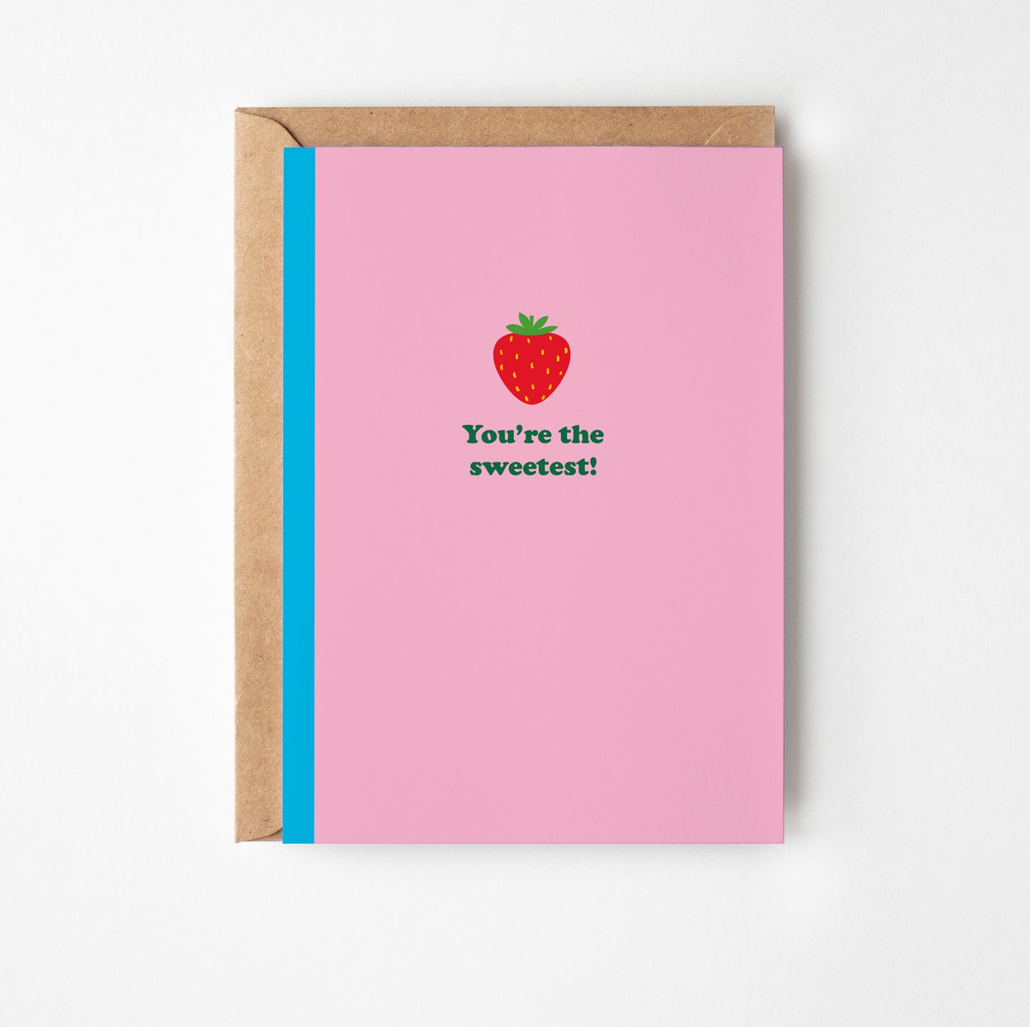 Greeting card with strawberry illustration and text on pink background