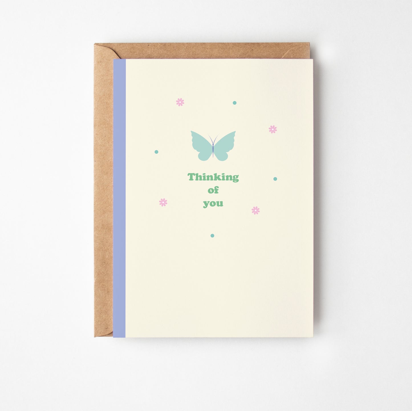 Greeting card with butterfly design and text 'Thinking of you' on a white background