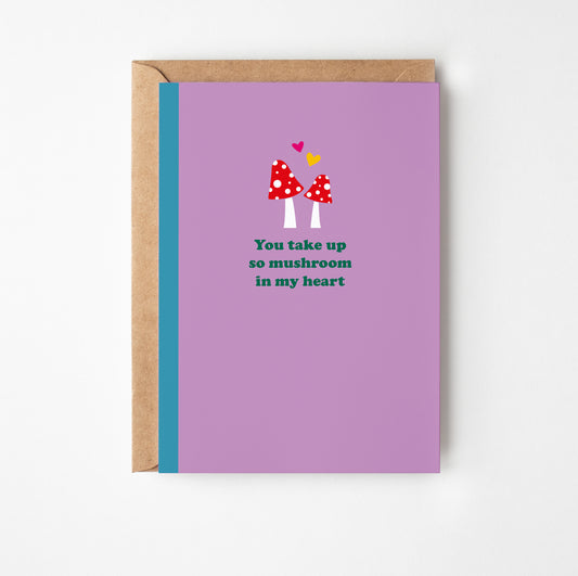 Greeting card with mushrooms and text on a purple background