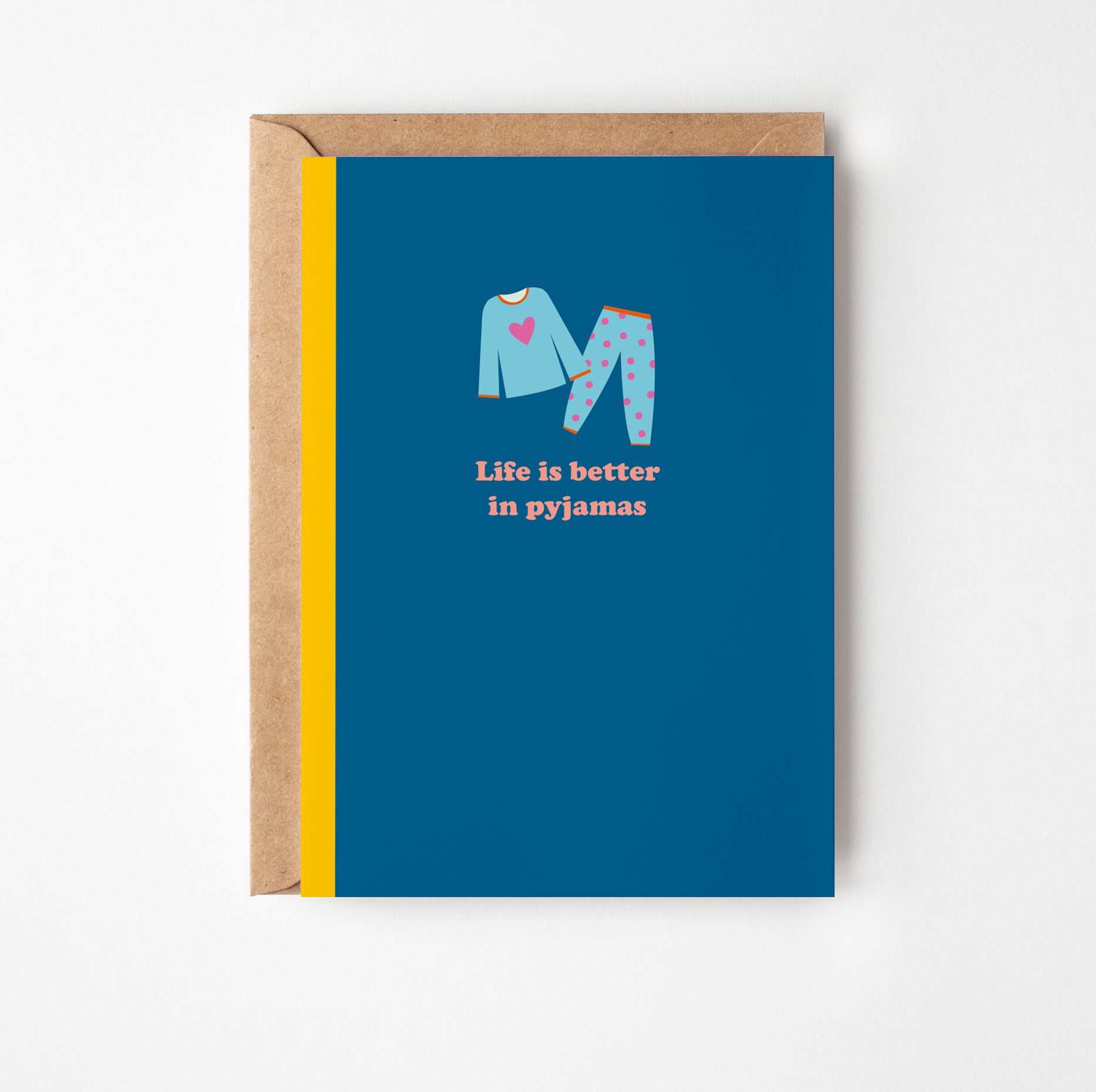 Greeting card with pajama illustration and 'Life is better in pyjamas' text on a blue background
