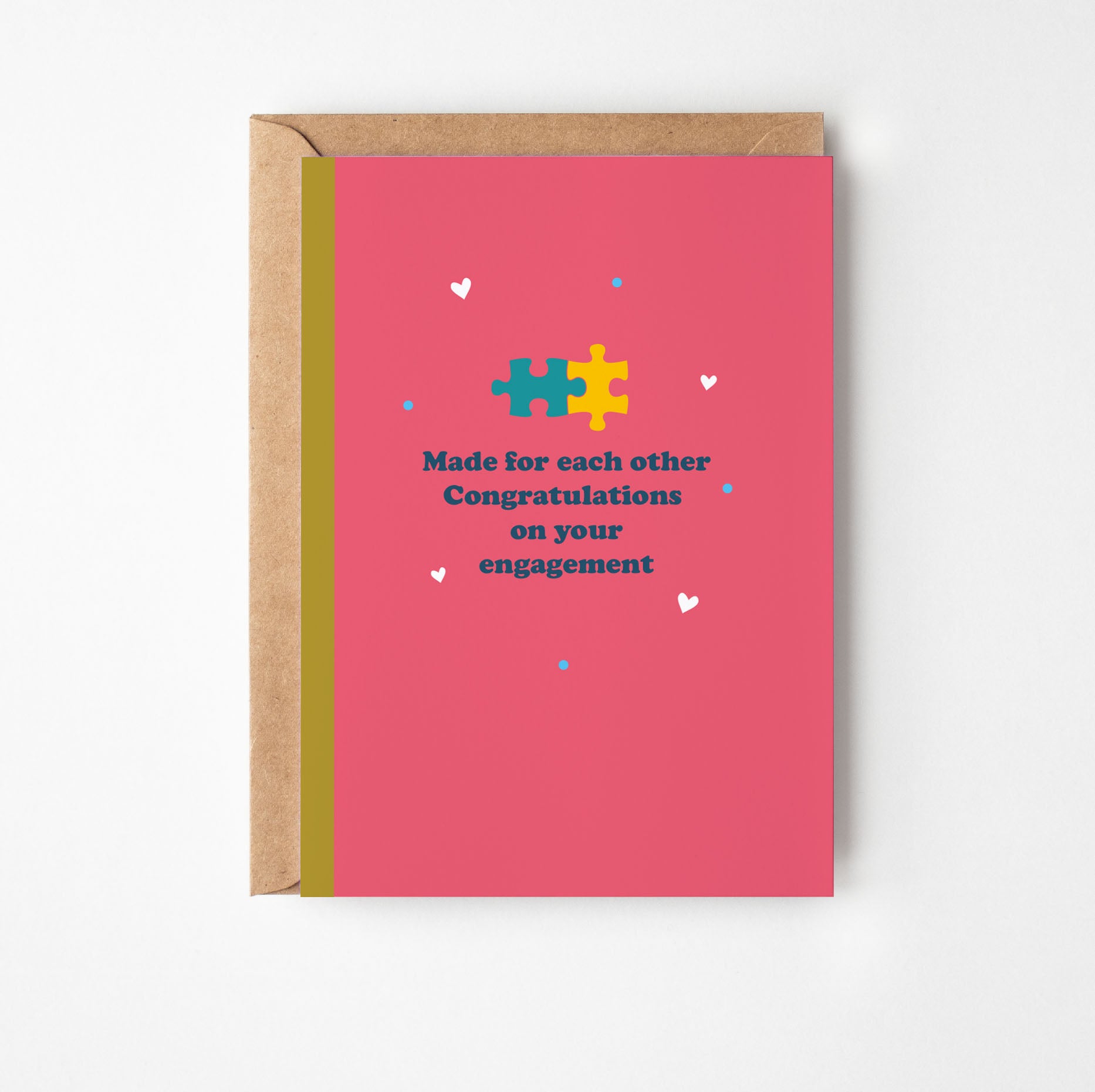 Engagement card with puzzle piece design and text on a pink background