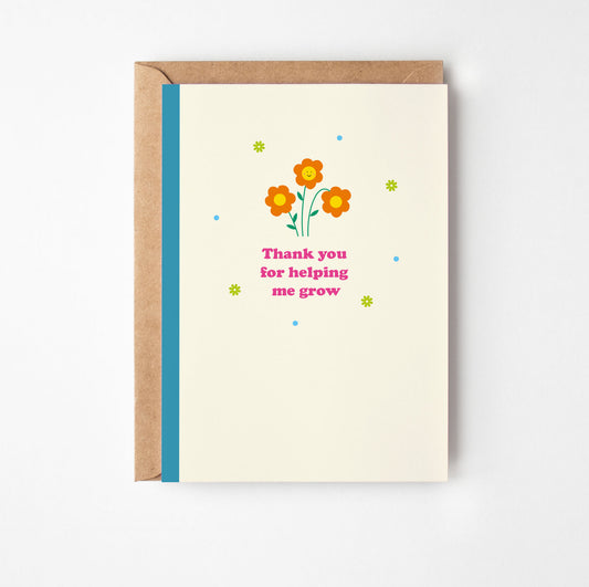 Greeting card with flowers and text on a white background